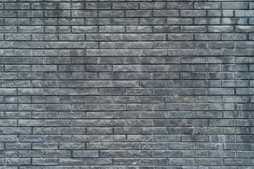 Gray brick wall texture. Brick background with copy space.