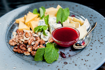 Sliced cheese with nuts