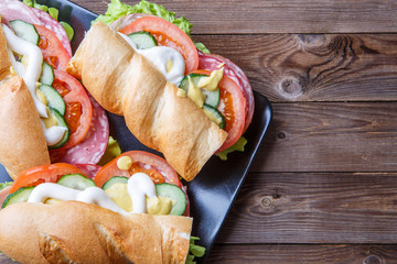 Baguette with sausage and vegetables