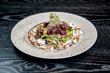 Salad with meat and cheese