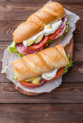 Appetizing sandwich with sausage ,vegetables