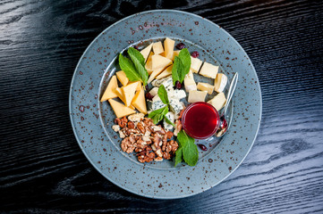 Sliced cheese with nuts