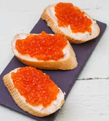 Photography of sandwiches with caviar