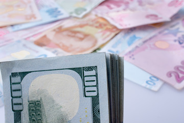 American dollar banknotes and Turksh Lira banknotes side by side