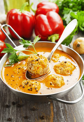 Meatball soup with  paprika