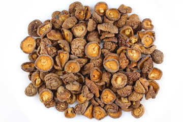 dried shiitake mushrooms isolated on a white background