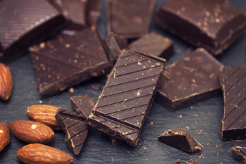 chocolate with almond on black background