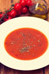 tomato soup in white plate