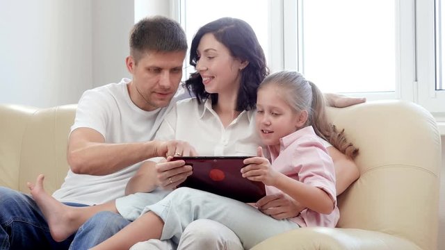Family using digital tablet. 