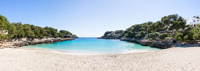 Mallorca Strand unter Palmen © Christian