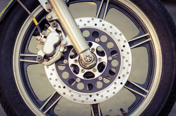 Vintage disc brake with motorcycle wheel.vintage style.
