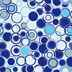Geometric seamless pattern. The elements round shapes having different sizes, arranged in any order on a light blue background. Design element.