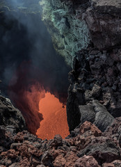 The boiling magma flows through lava tubes under a layer of cooled lava - volcano Tolbachik,...