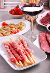 Mix of meat products and  appetizers served