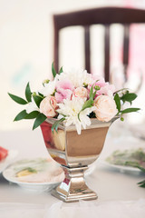 Wedding floristics. Decoration of a table of newlyweds fresh flowers