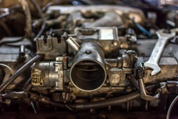 Fototapeta na wymiar Disassembled car dirty engine