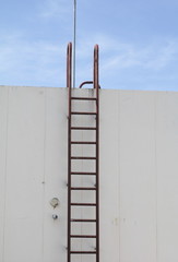 Staircase old vertical industrial metal rusted. to Water tank 