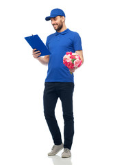 happy delivery man with flowers and clipboard