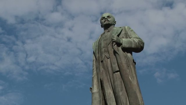 Clouds rushing over the statue of Lenin in Yalta, Ukraine 