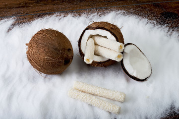 Coconuts and coconut sweets. Selective focus and small depth of field.