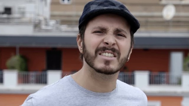 mad man attacks verbally at the camera