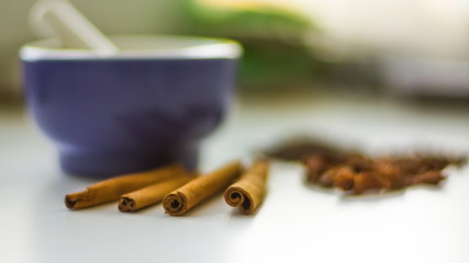 Spices are scattered on a table