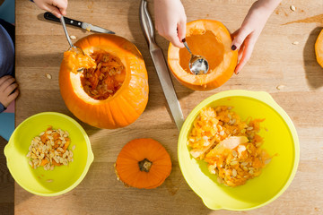 Scooping Seeds Out of Pumpkins