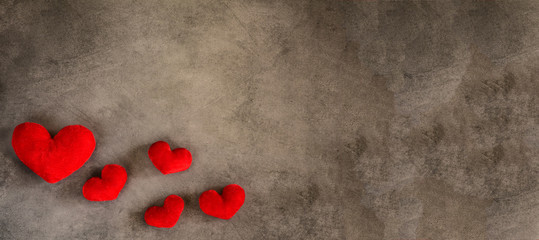 Valentine's Day - red hearts on a gray background - obrazy, fototapety, plakaty