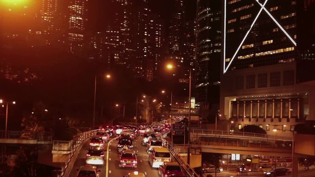 Night scene from Hong Kong - cars, taxis, buses at evening at streets of Hong Kong S.A.R., People's republic of China; Guangdong province; 