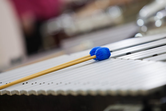 Drumsticks lying on vibraphone closeup