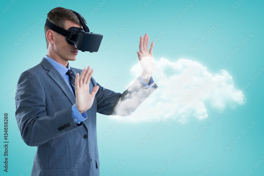 Poster composite image of businessman using virtual reality headset 3d