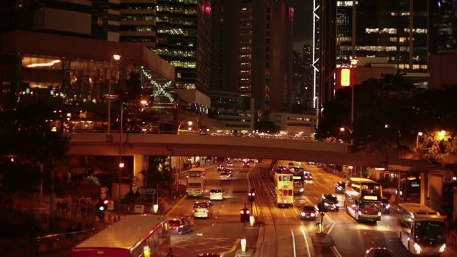 Night scene from Hong Kong - cars, taxis, buses at evening at streets of Hong Kong S.A.R., People's republic of China; Guangdong province; 