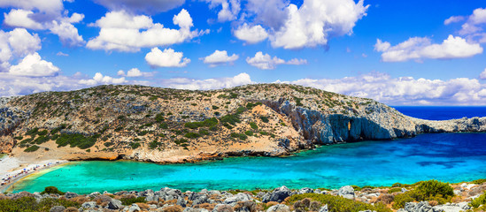 Fototapeta na wymiar wild crystal beaches of Greece - Kounoupa in Astypalea island