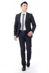 Asian businessman walk
