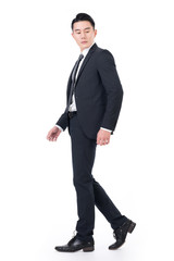 Asian businessman walk