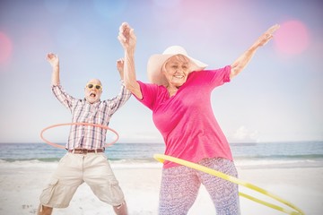 Senior couple doing hula hoop © vectorfusionart