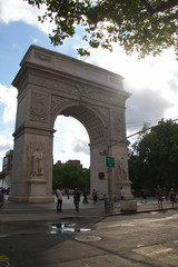Fototapeta na wymiar Washington Square Park Arch and branches with cloudy sky