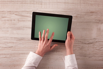 Business hands holding tablet