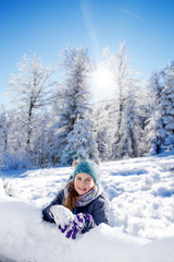 Fototapeta na wymiar Happy girl in snow