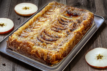 Homemade apple cake on a Rustic Wooden Background