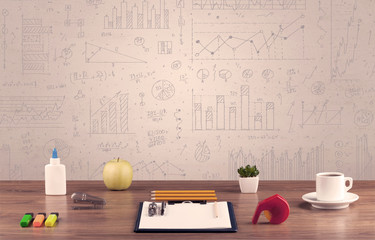 Graph charts and designer office desk