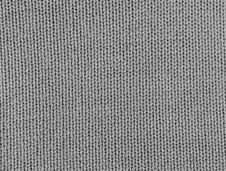Fototapeta na wymiar Grey color knitting texture.
