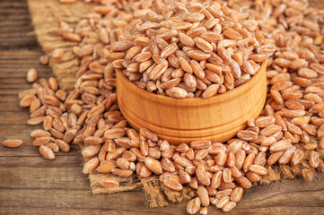 ripe wheat in wooden bowl