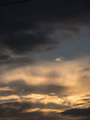 Sun Through Clouds of Grey