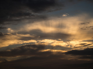 Sun Through Clouds of Grey