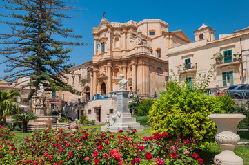 The facade of the church of St. Dominic - a magnificent specimen Sicilian Baroque in Noto, Sicily - obrazy, fototapety, plakaty