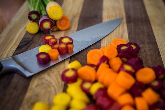 Assorted carrots chopped with knife 