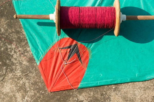 Kite and manja thread for kite fighting. This is a popular sport in Rajasthan and Gujrat during makar sankranti and uttarayan