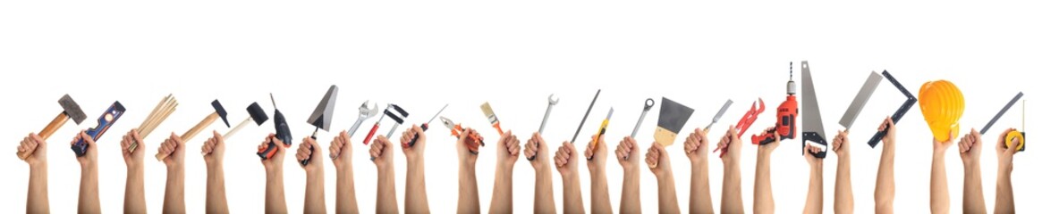 Hands holding tools on white background