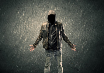 Spooky faceless guy standing in hoodie